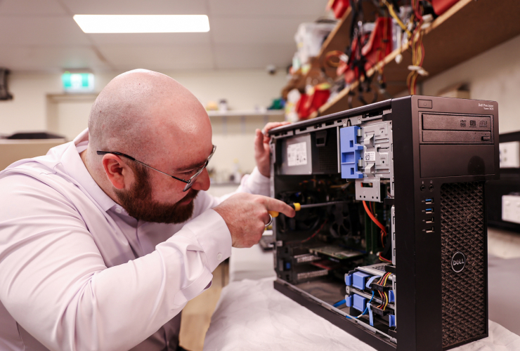 Darren working on a computer